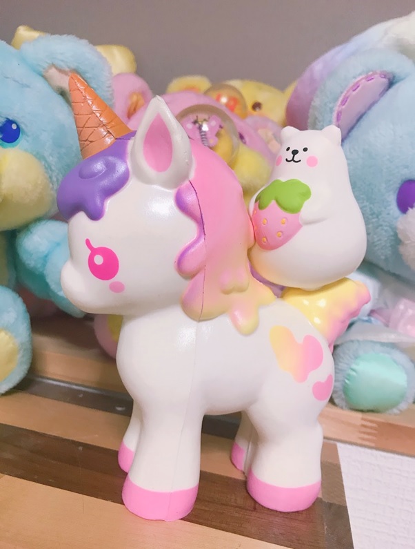 Close view of Unicorn & Marshmallow Bear in shelf