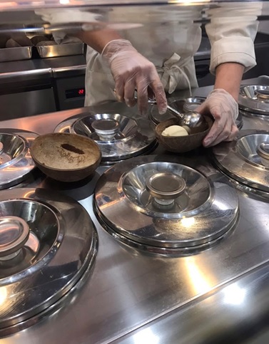 Serving ice cream in coconut shells  at Coconut Glen's Omotesando in Harajuku.