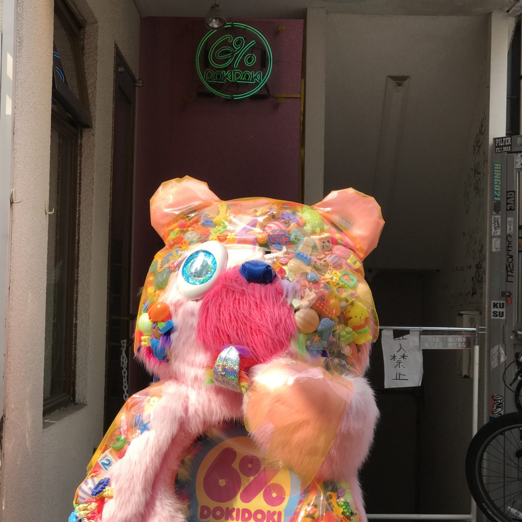 Large Pink Bear stands in front of stair to 6% DOKIDOKI, Harajuku, Tokyo